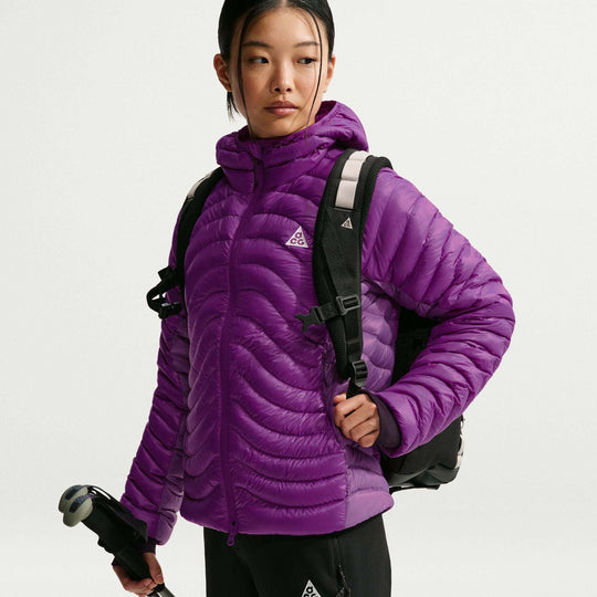 ACG Lava Flow Ultralight purple quilted puffer jacket with a hood, front zipper and lightweight nylon shell.