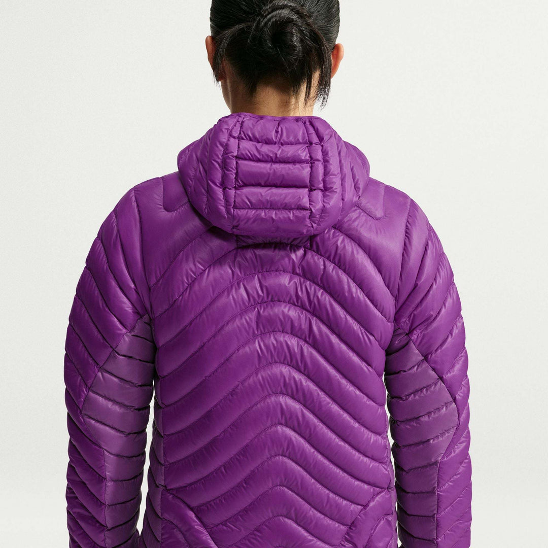 ACG Lava Flow Ultralight purple down jacket with a glossy ripstop shell, chevron quilting and attached hood.