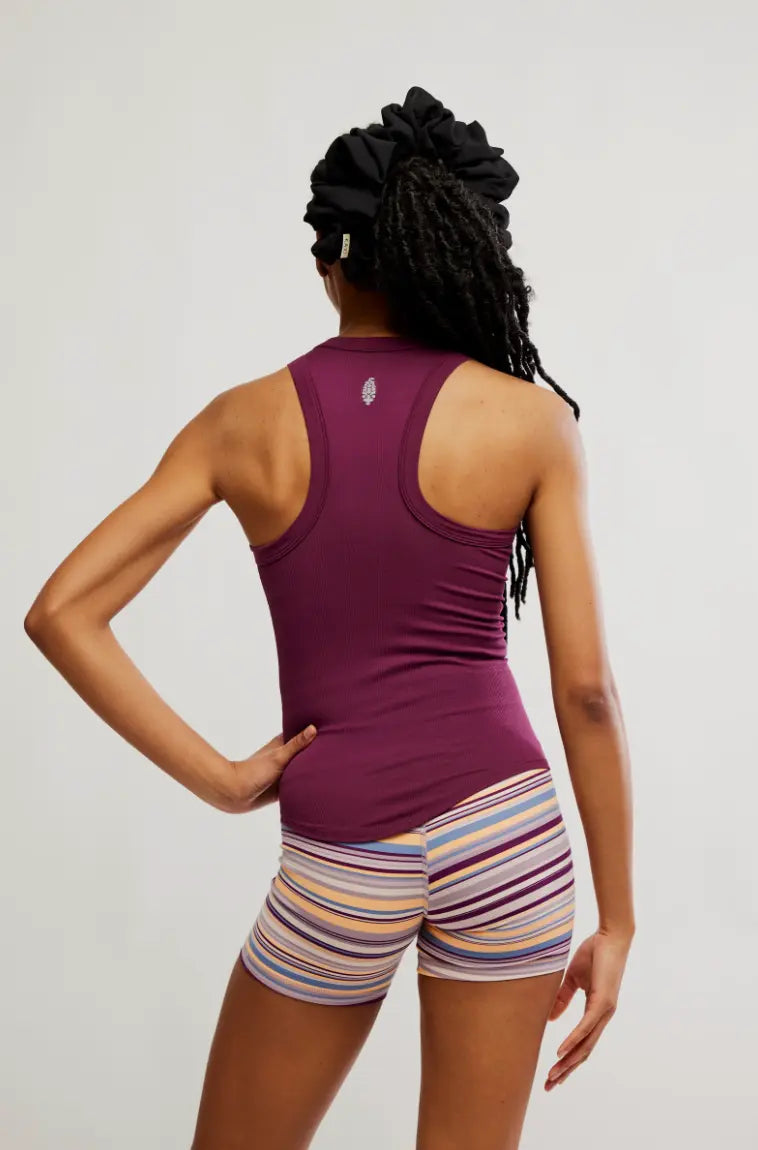 FP Movement Dynamite Tank — racerback with buti logo detail, stretchy stay-put ribbed fabric
