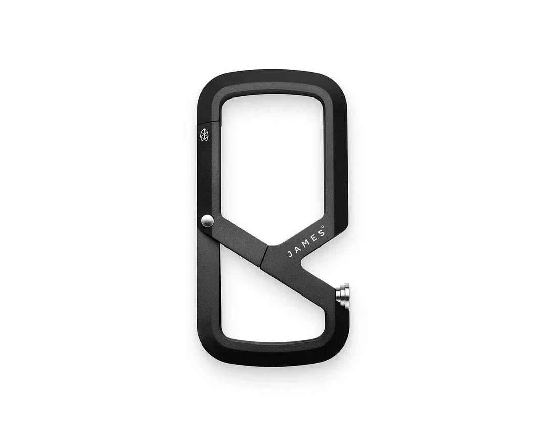 James Brand The Mehlville carabiner in matte black machined metal, with a dual-compartment shape and locking gate.