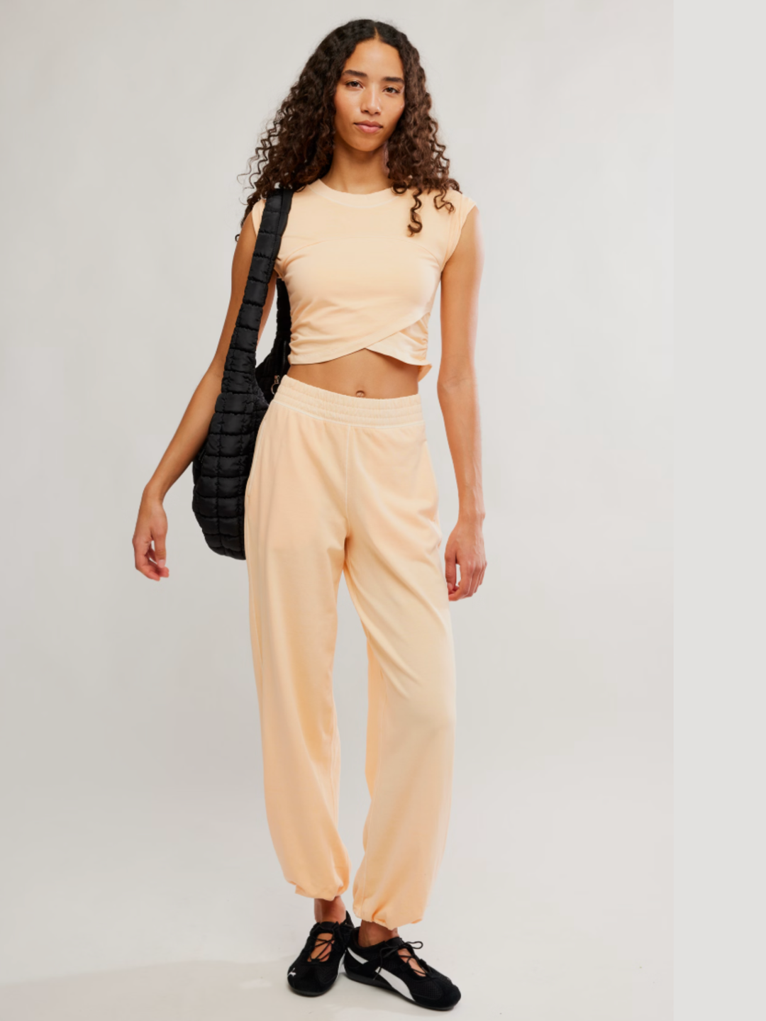 FP Movement Hot Shot Crossover Set in Pina Colada cropped muscle tee, wide leg ankle pant, high-rise waist